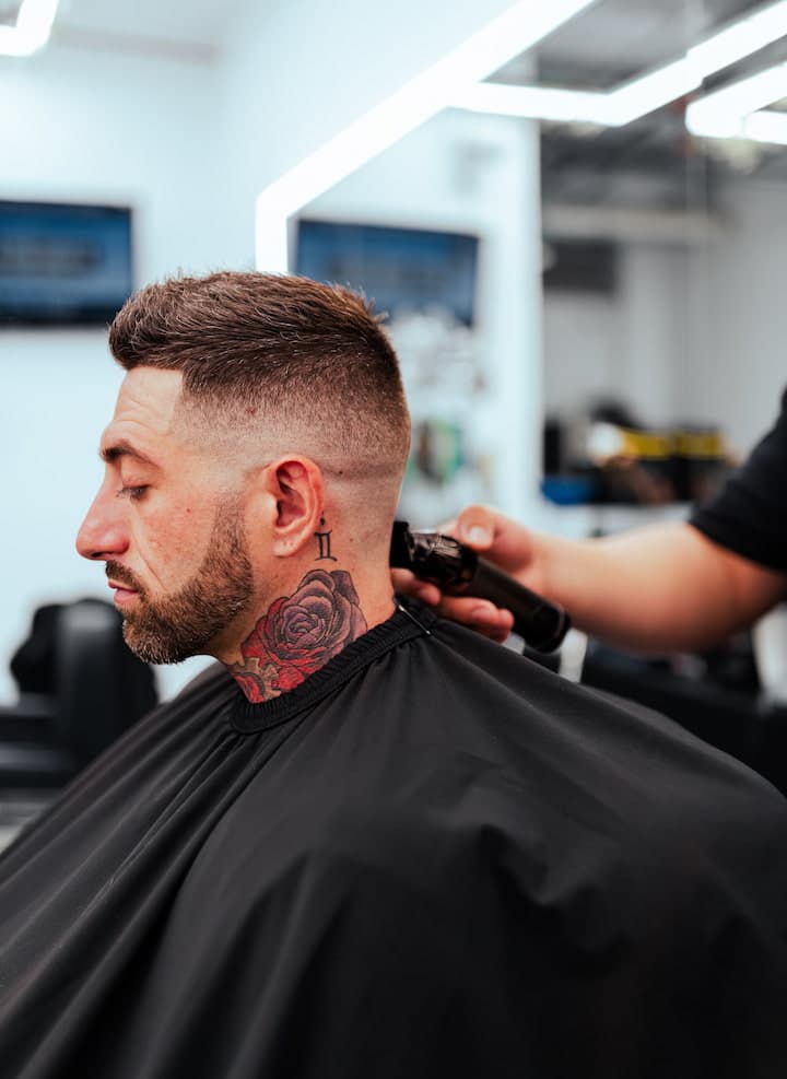 Galindo's barber providing a precision haircut